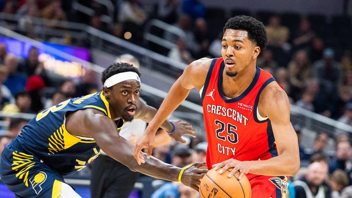 Nov 25, 2024; Indianapolis, Indiana, USA;  New Orleans Pelicans guard Trey Murphy III (25) dribbles the ball while Indiana Pacers forward Pascal Siakam (43) defends in the first half at Gainbridge Fieldhouse. Mandatory Credit: Trevor Ruszkowski-Imagn Images