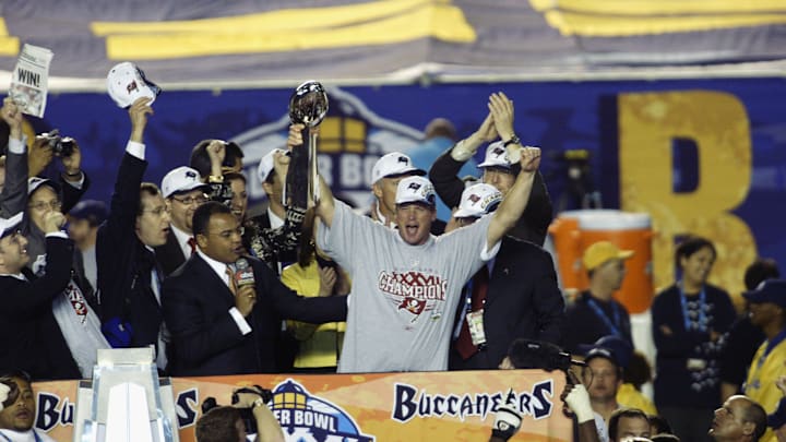 SAN DIEGO - JANUARY 26:  Head coach Jon Gruden of the Tampa Bay Buccaneers holds the Lombardi Trophy
