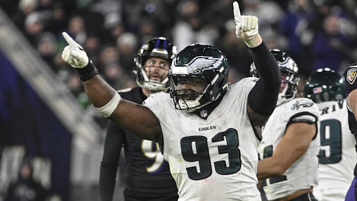 Dec 1, 2024; Baltimore, Maryland, USA;  Philadelphia Eagles defensive tackle Milton Williams (93) celebrates as Baltimore Ravens place kicker Justin Tucker (9) reacts to missing a second half field goal at M&T Bank Stadium. Mandatory Credit: Tommy Gilligan-Imagn Images
