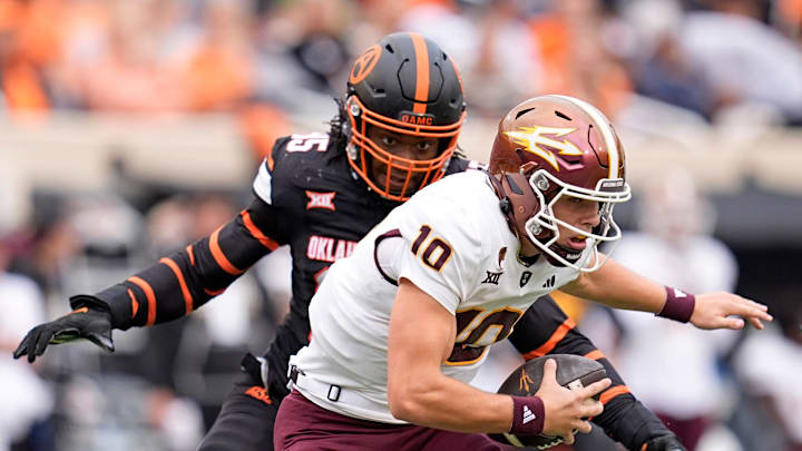 Oklahoma State Cowboys defensive end Jaleel Johnson (95) sacks Arizona State Sun Devils quarterback Sam Leavitt (10) in the first half the college football game between the Oklahoma State Cowboys and the Arizona State Sun Devils at Boone Pickens Stadium in Stillwater, Okla., Saturday, Nov., 2, 2024.