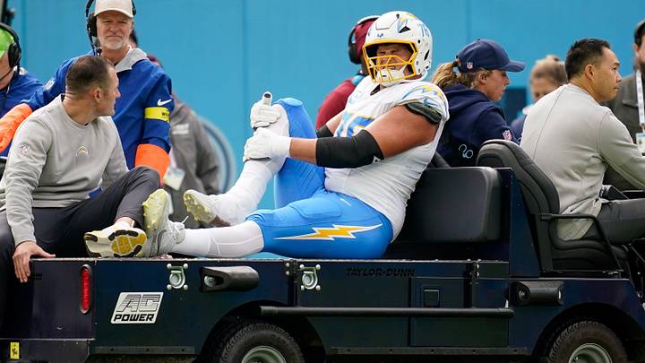 Los Angeles Chargers offensive tackle Joe Alt (76) is carted off after an injury during the second quarter against the Tennessee Titans at Nissan Stadium in Nashville, Tenn., Sunday, Nov. 2, 2025.