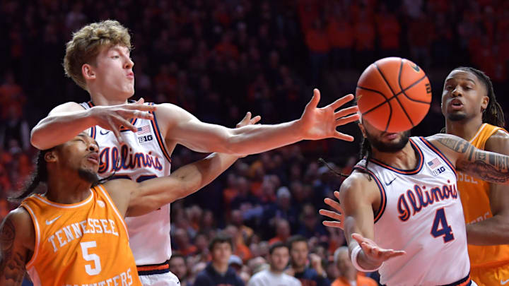 Dec 14, 2024; Champaign, Illinois, USA;  Illinois Fighting Illini forward Ben Humrichous (3) and Tennessee Volunteers guard Zakai Zeigler (5) reach for a loose ball during the first half at State Farm Center. Mandatory Credit: Ron Johnson-Imagn Images