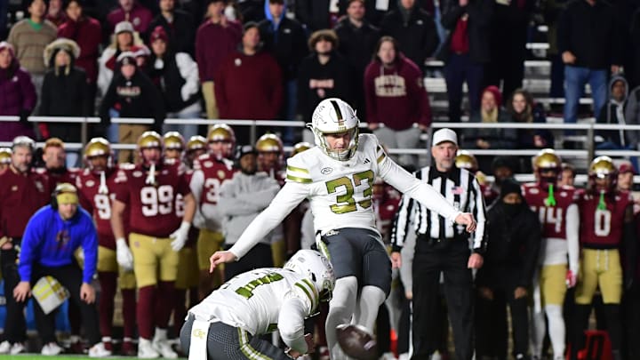 Nov 15, 2025; Chestnut Hill, Massachusetts, USA; Georgia Tech Yellow Jackets kicker Aidan Birr (33) kicks a field goal in the last minute of the fourth quarter against the Boston College Eagles at Alumni Stadium. Mandatory Credit: Bob DeChiara-Imagn Images