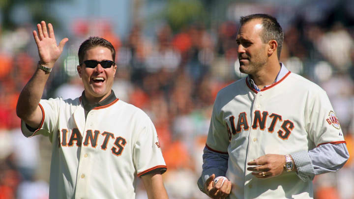 San Francisco Giants former players J.T. Snow (left) and Robb Nen (right) prepare to throw out the ceremonial first pitch before game three of the 2010 NLCS against the Philadelphia Phillies at the Giants. San Francisco Giants former players J.T. Snow (left) and Robb Nen (right) prepare to throw out the ceremonial first pitch before game three of the 2010 NLCS against the Philadelphia Phillies at the Giants.