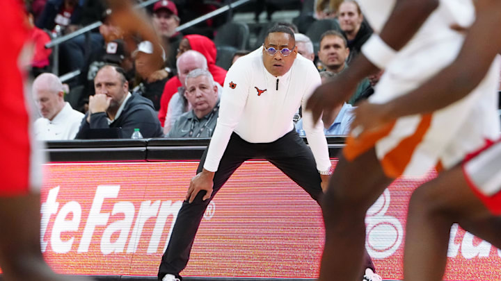 Nov 4, 2024; Las Vegas, Nevada, USA; Texas Longhorns head coach Rodney Terry watches play against the Ohio State Buckeyes during the first half at T-Mobile Arena. Mandatory Credit: Stephen R. Sylvanie-Imagn Images Nov 4, 2024; Las Vegas, Nevada, USA; Texas Longhorns head coach Rodney Terry watches play against the Ohio State Buckeyes during the first half at T-Mobile Arena. Mandatory Credit: Stephen R. Sylvanie-Imagn Images