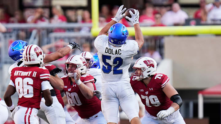 Buffalo linebacker Shaun Dolac (52) intercepts the ball during the fourth quarter of the game on Saturday September 2, 2023 at Camp Randall Stadium in Madison, Wis. Buffalo linebacker Shaun Dolac (52) intercepts the ball during the fourth quarter of the game on Saturday September 2, 2023 at Camp Randall Stadium in Madison, Wis.