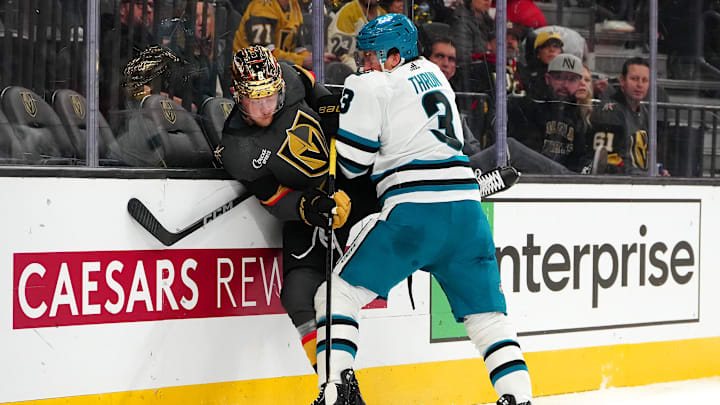 Dec 10, 2023; Las Vegas, Nevada, USA; San Jose Sharks defenseman Henry Thrun (3) checks Vegas Golden