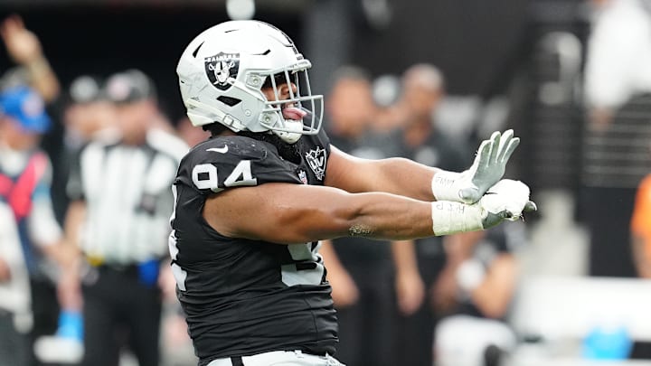Sep 22, 2024; Paradise, Nevada, USA; Las Vegas Raiders defensive tackle Christian Wilkins (94) celebrates after getting a sack against the Carolina Panthers during the second quarter at Allegiant Stadium. Mandatory Credit: Stephen R. Sylvanie-Imagn Images Sep 22, 2024; Paradise, Nevada, USA; Las Vegas Raiders defensive tackle Christian Wilkins (94) celebrates after getting a sack against the Carolina Panthers during the second quarter at Allegiant Stadium. Mandatory Credit: Stephen R. Sylvanie-Imagn Images