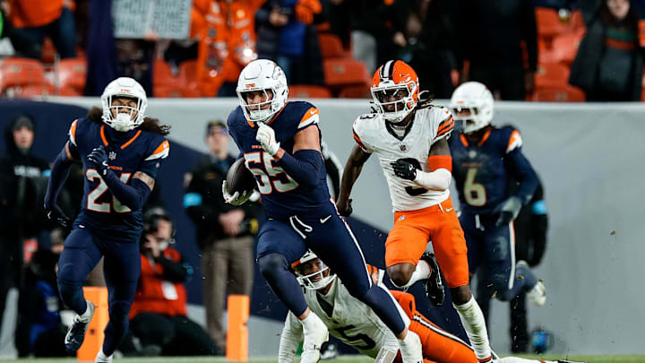 Denver Broncos linebacker Cody Barton runs back an interception against Cleveland Browns quarterback Jameis Winston. Mandatory Credit: Isaiah J. Downing-Imagn Images