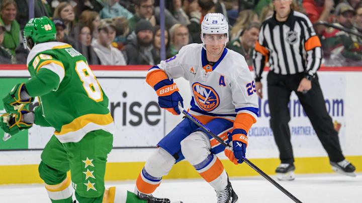 Feb 8, 2025; Saint Paul, Minnesota, USA;  New York Islanders forward Brock Nelson (29) controls the puck against the Minnesota Wild during the first period at Xcel Energy Center. Mandatory Credit: Nick Wosika-Imagn Images