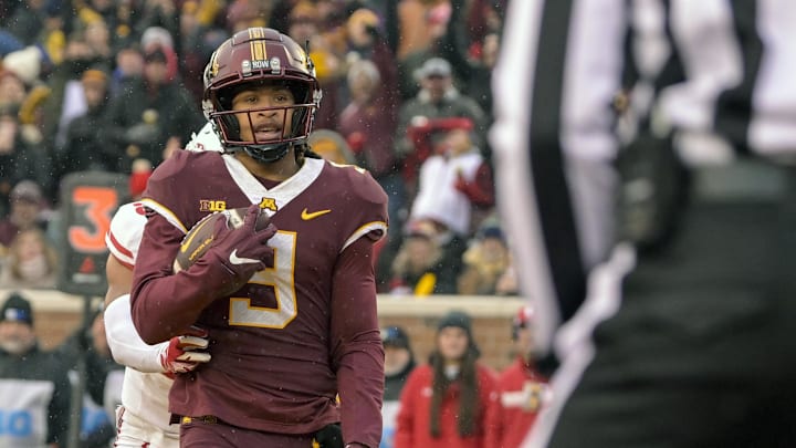 Nov 25, 2023; Minneapolis, Minnesota, USA; Minnesota Golden Gophers wide receiver Daniel Jackson (9) at the end of his 7-yard touchdown reception against the Wisconsin Badgers during the second quarter at Huntington Bank Stadium. Mandatory Credit: Nick Wosika-USA TODAY Sports