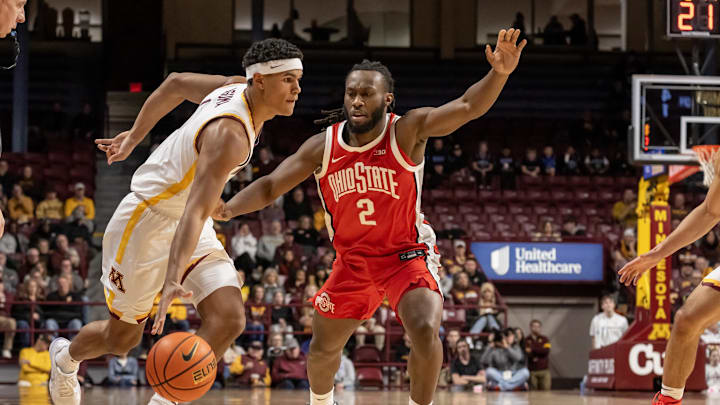 Jan 6, 2025; Minneapolis, Minnesota, USA; Minnesota Golden Gophers guard Isaac Asuma (1) controls the ball as Ohio State Buckeyes guard Bruce Thornton (2) defends during the first half at Williams Arena. Mandatory Credit: Nick Wosika-Imagn Images Jan 6, 2025; Minneapolis, Minnesota, USA; Minnesota Golden Gophers guard Isaac Asuma (1) controls the ball as Ohio State Buckeyes guard Bruce Thornton (2) defends during the first half at Williams Arena. Mandatory Credit: Nick Wosika-Imagn Images