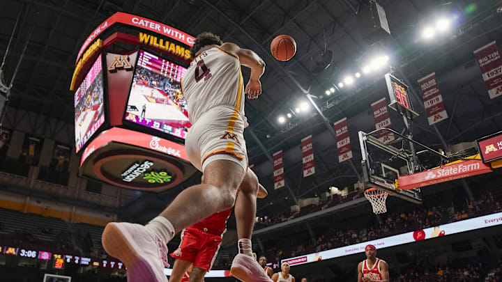 Jan 6, 2025; Minneapolis, Minnesota, USA; Minnesota Golden Gophers forward Kadyn Betts (4) saves the ball from going out of bounds against the Ohio State Buckeyes during the first half at Williams Arena. Mandatory Credit: Nick Wosika-Imagn Images Jan 6, 2025; Minneapolis, Minnesota, USA; Minnesota Golden Gophers forward Kadyn Betts (4) saves the ball from going out of bounds against the Ohio State Buckeyes during the first half at Williams Arena. Mandatory Credit: Nick Wosika-Imagn Images