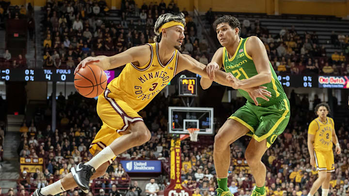 Jan 25, 2025; Minneapolis, Minnesota, USA; Minnesota Golden Gophers forward Dawson Garcia (3) controls the ball as Oregon Ducks forward James Cooper (12) defends during the first half at Williams Arena. Mandatory Credit: Nick Wosika-Imagn Images Jan 25, 2025; Minneapolis, Minnesota, USA; Minnesota Golden Gophers forward Dawson Garcia (3) controls the ball as Oregon Ducks forward James Cooper (12) defends during the first half at Williams Arena. Mandatory Credit: Nick Wosika-Imagn Images