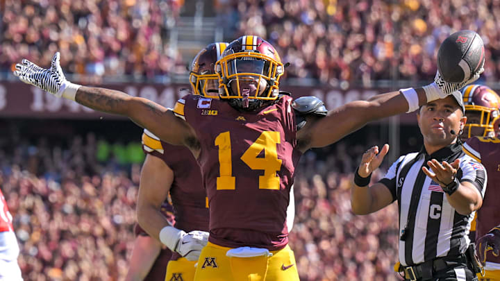 Sep 27, 2025; Minneapolis, Minnesota, USA; Minnesota Golden Gophers defensive back Kerry Brown (14) celebrates his interception against Rutgers Scarlet Knights during the second quarter at Huntington Bank Stadium. Mandatory Credit: Nick Wosika-Imagn Images Sep 27, 2025; Minneapolis, Minnesota, USA; Minnesota Golden Gophers defensive back Kerry Brown (14) celebrates his interception against Rutgers Scarlet Knights during the second quarter at Huntington Bank Stadium. Mandatory Credit: Nick Wosika-Imagn Images