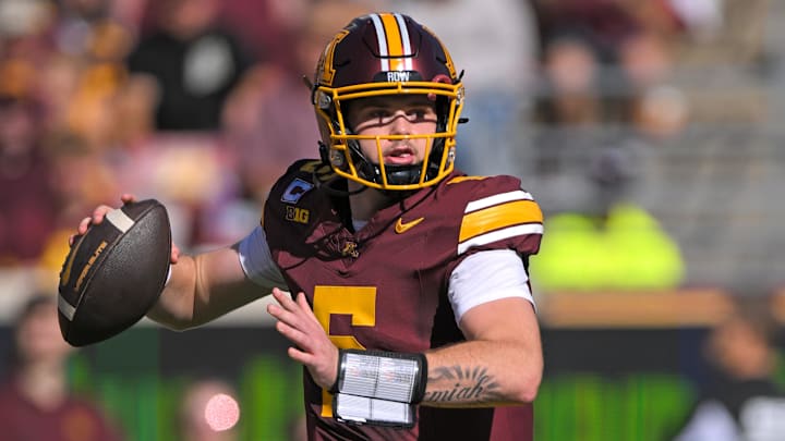 Sep 27, 2025; Minneapolis, Minnesota, USA; Minnesota Golden Gophers quarterback Drake Lindsey (5) makes a pass against Rutgers Scarlet Knights during the first quarter at Huntington Bank Stadium. Mandatory Credit: Nick Wosika-Imagn Images Sep 27, 2025; Minneapolis, Minnesota, USA; Minnesota Golden Gophers quarterback Drake Lindsey (5) makes a pass against Rutgers Scarlet Knights during the first quarter at Huntington Bank Stadium. Mandatory Credit: Nick Wosika-Imagn Images