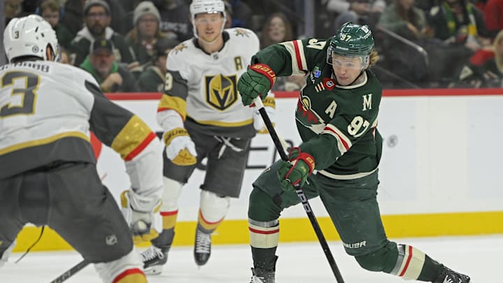 Dec 15, 2024; Saint Paul, Minnesota, USA;  Minnesota Wild forward Kirill Kaprizov (97) takes a shot on goal against The Vegas Golden Knights during the second period at Xcel Energy Center. Mandatory Credit: Nick Wosika-Imagn Images