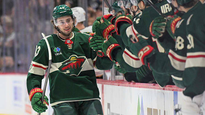 Dec 14, 2025; Saint Paul, Minnesota, USA;  Minnesota Wild defensemen Quinn Hughes (43) celebrates after scoring a goal against the Boston Bruins during the third period at Grand Casino Arena. Mandatory Credit: Nick Wosika-Imagn Images

