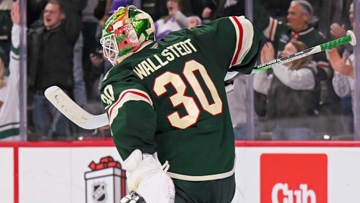 Dec 13, 2025; Saint Paul, Minnesota, USA;  Minnesota Wild goalie Jesper Wallstedt (30) celebrates a victory over the Ottawa Senators at Grand Casino Arena. Mandatory Credit: Nick Wosika-Imagn Images