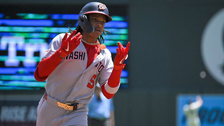 Jul 27, 2025; Minneapolis, Minnesota, USA;  Washington Nationals infielder C.J. Abrams (5) celebrates his solo home run against the Minnesota Twins during the first inning at Target Field. 