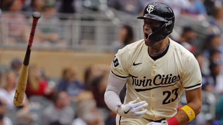 Minnesota Twins designated hitter Royce Lewis (23) flips the bat and yells to his dugout on his two-run home run against the Colorado Rockies in the sixth inning at Target Field on June 12.