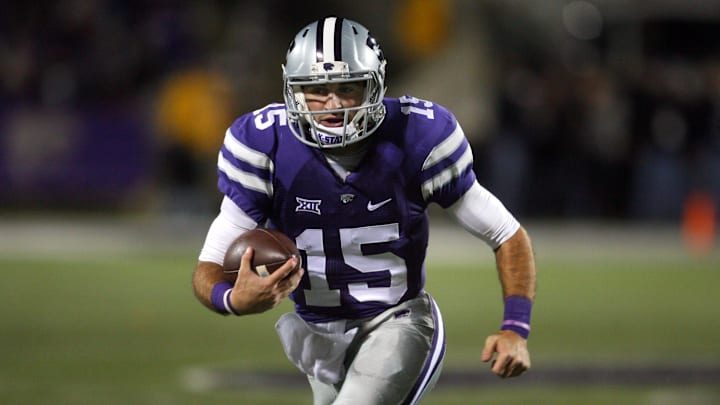 Nov 1, 2014; Manhattan, KS, USA; Kansas State Wildcats quarterback Jake Waters (15) finds room to run during a 48-14 win against the Oklahoma State Cowboys at Bill Snyder Family Stadium. Mandatory Credit: Scott Sewell-Imagn Images