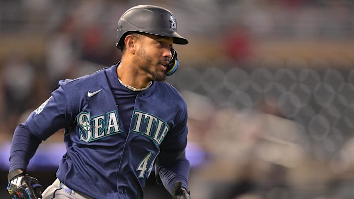 Apr 28, 2026; Minneapolis, Minnesota, USA; Seattle Mariners outfielder Julio Rodriguez (44) heads to second on a two RBI double against the Minnesota Twins during the ninth inning at Target Field. Mandatory Credit: Nick Wosika-Imagn Images