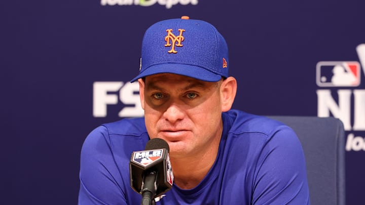 Oct 13, 2024; Los Angeles, California, USA; New York Mets manager Carlos Mendoza (64) speaks to the media before game one of the NLCS for the 2024 MLB Playoffs at Dodger Stadium. Mandatory Credit: Kiyoshi Mio-Imagn Images Oct 13, 2024; Los Angeles, California, USA; New York Mets manager Carlos Mendoza (64) speaks to the media before game one of the NLCS for the 2024 MLB Playoffs at Dodger Stadium. Mandatory Credit: Kiyoshi Mio-Imagn Images