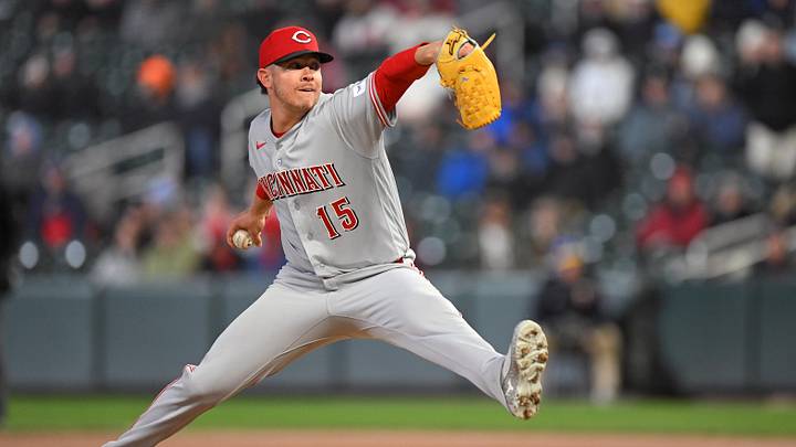 Apr 17, 2026; Minneapolis, Minnesota, USA;  Cincinnati Reds relief pitcher Emilio Pagan (15) delivers a pitch against the Minnesota Twins during the ninth inning inning at Target Field. Mandatory Credit: Nick Wosika-Imagn Images