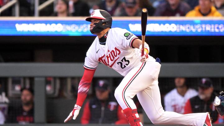 Apr 28, 2026; Minneapolis, Minnesota, USA; Minnesota Twins infielder Royce Lewis (23) hits a single against the Seattle Mariners during the third inning at Target Field. Mandatory Credit: Nick Wosika-Imagn Images