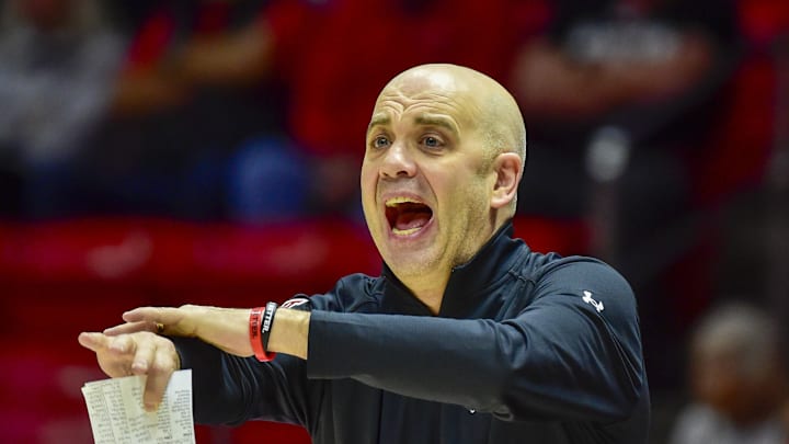 Feb 15, 2025; Salt Lake City, Utah, USA; Utah Utes head coach Craig Smith reacts to a call against the Kansas Jayhawks during the first half at the Jon M. Huntsman Center. Mandatory Credit: Christopher Creveling-Imagn Images Feb 15, 2025; Salt Lake City, Utah, USA; Utah Utes head coach Craig Smith reacts to a call against the Kansas Jayhawks during the first half at the Jon M. Huntsman Center. Mandatory Credit: Christopher Creveling-Imagn Images