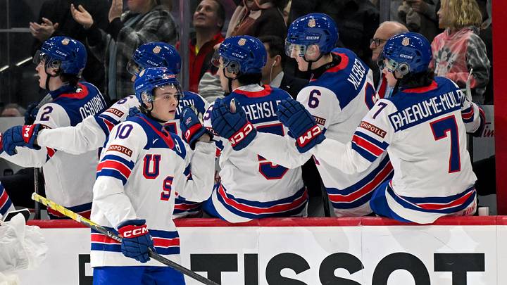 Dec 29, 2025; St. Paul, Minnesota, USA; USA forward James Hagens (10) celebrates his goal against Slovakia during the second period of Group A play in the 2026 IIHF World Junior Championship at Grand Casino Arena. Mandatory Credit: Nick Wosika-Imagn Images