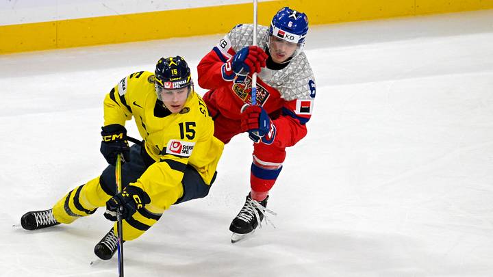 Jan 5, 2026; St. Paul, Minnesota, USA; Sweden forward Ivar Stenberg (15) controls the puck as Czechia defensemen Radim Mrtka (6) gives chase during the first period in the final of the 2026 IIHF World Junior Championship ice hockey tournament at Grand Casino Arena. Mandatory Credit: Nick Wosika-Imagn Images Jan 5, 2026; St. Paul, Minnesota, USA; Sweden forward Ivar Stenberg (15) controls the puck as Czechia defensemen Radim Mrtka (6) gives chase during the first period in the final of the 2026 IIHF World Junior Championship ice hockey tournament at Grand Casino Arena. Mandatory Credit: Nick Wosika-Imagn Images