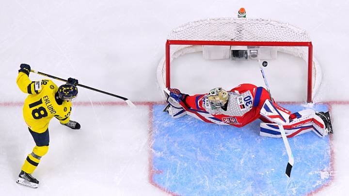 Jan 5, 2026; St. Paul, Minnesota, USA; Sweden forward Victor Eklund (18) scores a power play goal on Czechia goalie Michal Orsulak (30) during the second period in the final of the 2026 IIHF World Junior Championship ice hockey tournament at Grand Casino Arena. Mandatory Credit: Nick Wosika-Imagn Images