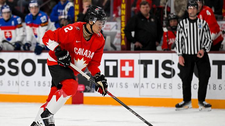 Jan 2, 2026; Minneapolis, Minnesota, USA; Canada defensemen Kashawn Aitcheson (2) controls the puck against Slovakia during the second period in the quarterfinals of the 2026 IIHF World Junior Championship at 3M Arena. Mandatory Credit: Nick Wosika-Imagn Images Jan 2, 2026; Minneapolis, Minnesota, USA; Canada defensemen Kashawn Aitcheson (2) controls the puck against Slovakia during the second period in the quarterfinals of the 2026 IIHF World Junior Championship at 3M Arena. Mandatory Credit: Nick Wosika-Imagn Images