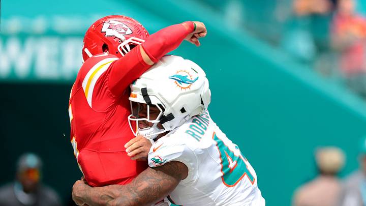 Sep 27, 2026; Miami Gardens, Florida, USA;  Miami Dolphins defensive end Chop Robinson (44) hits Kansas City Chiefs quarterback Patrick Mahomes (15) during the third quarter at Hard Rock Stadium.  Mandatory Credit: Sam Navarro-Imagn Images