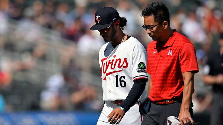 Aug 16, 2026; Minneapolis, Minnesota, USA; Minnesota Twins outfielder Austin Martin (16) is helped off the field by a member of the training staff after injuring himself going after a fly ball against the Philadelphia Phillies during the eighth inning at Target Field. Mandatory Credit: Nick Wosika-Imagn Images Aug 16, 2026; Minneapolis, Minnesota, USA; Minnesota Twins outfielder Austin Martin (16) is helped off the field by a member of the training staff after injuring himself going after a fly ball against the Philadelphia Phillies during the eighth inning at Target Field. Mandatory Credit: Nick Wosika-Imagn Images