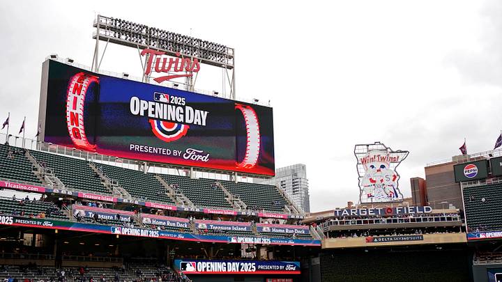 The scoreboard displays the Opening Day logo for the Minnesota Twins The scoreboard displays the Opening Day logo for the Minnesota Twins