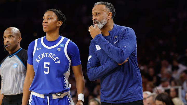 Mar 28, 2026; Fort Worth, TX, USA; Kentucky Wildcats head coach Kenny Brooks speaks with Kentucky Wildcats guard Tonie Morgan (5) during the first half against the Texas Longhorns at Dickies Arena. Mandatory Credit: Chris Jones-Imagn Images Mar 28, 2026; Fort Worth, TX, USA; Kentucky Wildcats head coach Kenny Brooks speaks with Kentucky Wildcats guard Tonie Morgan (5) during the first half against the Texas Longhorns at Dickies Arena. Mandatory Credit: Chris Jones-Imagn Images