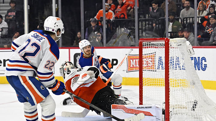 Nov 12, 2025; Philadelphia, Pennsylvania, USA; Edmonton Oilers center Jack Roslovic (28) scores the game winning goal in overtime past Philadelphia Flyers goaltender Dan Vladar (80) at Xfinity Mobile Arena. Mandatory Credit: Eric Hartline-Imagn Images