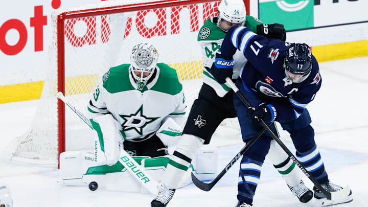 May 7, 2025; Winnipeg, Manitoba, CAN; Dallas Stars goalie Jake Oettinger (29) makes a save against the Winnipeg Jets during the third period in game one of the second round of the 2025 Stanley Cup Playoffs at Canada Life Centre. Mandatory Credit: Terrence Lee-Imagn Images