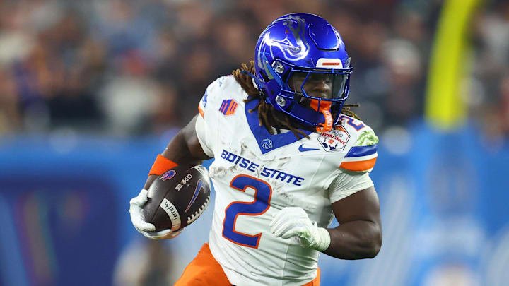 Dec 31, 2024; Glendale, AZ, USA; Boise State Broncos running back Ashton Jeanty (2) rushes the ball against the Penn State Nittany Lions during the first half in the Fiesta Bowl at State Farm Stadium. Mandatory Credit: Mark J. Rebilas-Imagn Images Dec 31, 2024; Glendale, AZ, USA; Boise State Broncos running back Ashton Jeanty (2) rushes the ball against the Penn State Nittany Lions during the first half in the Fiesta Bowl at State Farm Stadium. Mandatory Credit: Mark J. Rebilas-Imagn Images