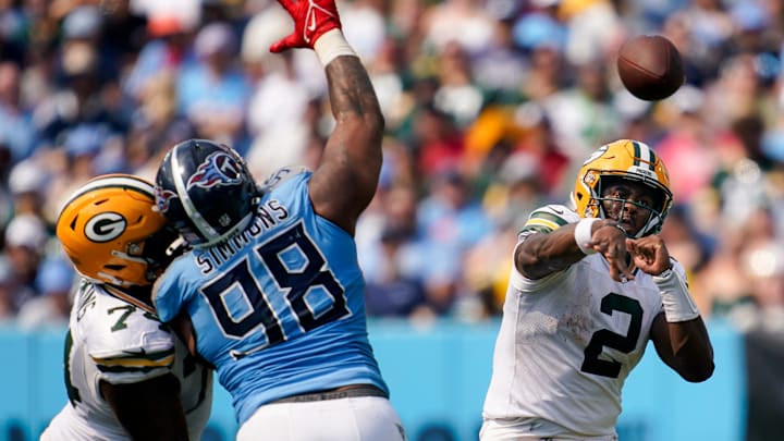 Green Bay Packers quarterback Malik Willis (2) throws past Tennessee Titans defensive tackle Jeffery Simmons (98) during the fourth quarter at Nissan Stadium in Nashville, Tenn., Sunday, Sept. 22, 2024.