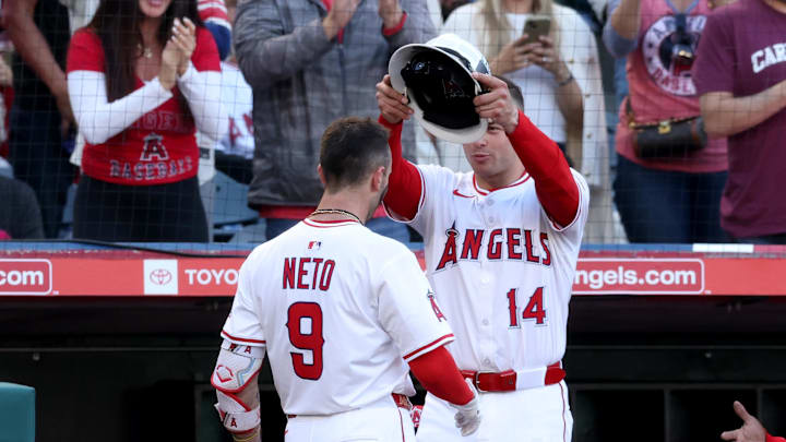 May 2, 2025; Anaheim, California, USA; Los Angeles Angels shortstop Zach Neto (9) celebrates with catcher Logan O'Hoppe (14) after hitting a home rub during the 1st inning against the Detroit Tigers at Angel Stadium. Mandatory Credit: Jason Parkhurst-Imagn Images