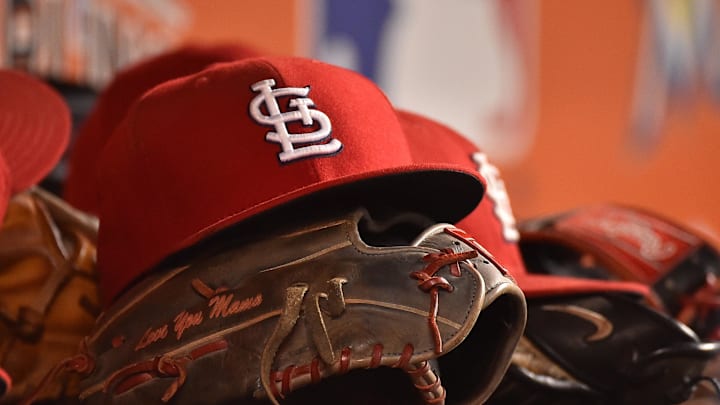 Jul 29, 2016; Miami, FL, USA; A detailed view of a hat and glove in the dugout of the St. Louis Cardinals in the game against the Miami Marlins at Marlins Park. The Cardinals defeated the Marlins 11-6. Mandatory Credit: Jasen Vinlove-Imagn Images Jul 29, 2016; Miami, FL, USA; A detailed view of a hat and glove in the dugout of the St. Louis Cardinals in the game against the Miami Marlins at Marlins Park. The Cardinals defeated the Marlins 11-6. Mandatory Credit: Jasen Vinlove-Imagn Images