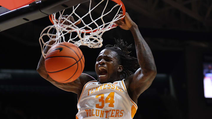 Nov 17, 2025; Knoxville, Tennessee, USA;  Tennessee Volunteers center Felix Okpara (34) dunks the ball against the Rice Owls during the first half at Thompson-Boling Arena at Food City Center. Mandatory Credit: Randy Sartin-Imagn Images