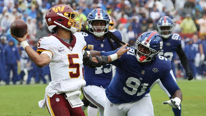 Oct 11, 2026; Landover, Maryland, USA; Washington Commanders quarterback Jayden Daniels (5) passes the ball under pressure from New York Giants defensive tackle Darius Alexander (91) at Northwest Stadium. Mandatory Credit: Geoff Burke-Imagn Images Oct 11, 2026; Landover, Maryland, USA; Washington Commanders quarterback Jayden Daniels (5) passes the ball under pressure from New York Giants defensive tackle Darius Alexander (91) at Northwest Stadium. Mandatory Credit: Geoff Burke-Imagn Images