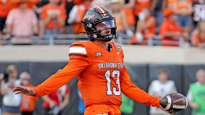 Oklahoma State's Garret Rangel (13) reacts after a delay of game penalty in the second half of the college football between the Oklahoma State University Cowboys and the Utah Utes at Boone Pickens Stadium in Stillwater, Okla., Saturday, Sept., 21, 2024. Oklahoma State's Garret Rangel (13) reacts after a delay of game penalty in the second half of the college football between the Oklahoma State University Cowboys and the Utah Utes at Boone Pickens Stadium in Stillwater, Okla., Saturday, Sept., 21, 2024.