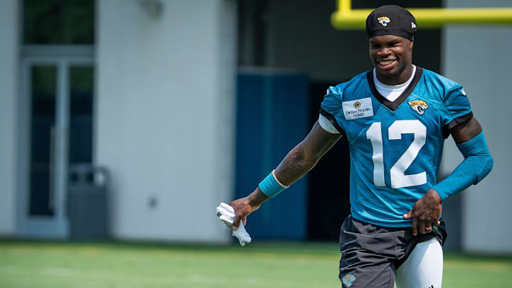 Jacksonville Jaguars wide receiver Travis Hunter (12) has a laugh after the seventh organized team activity at the Miller Electric Center in Jacksonville, Fla. Monday, June 2, 2025. [Doug Engle/Florida Times-Union]