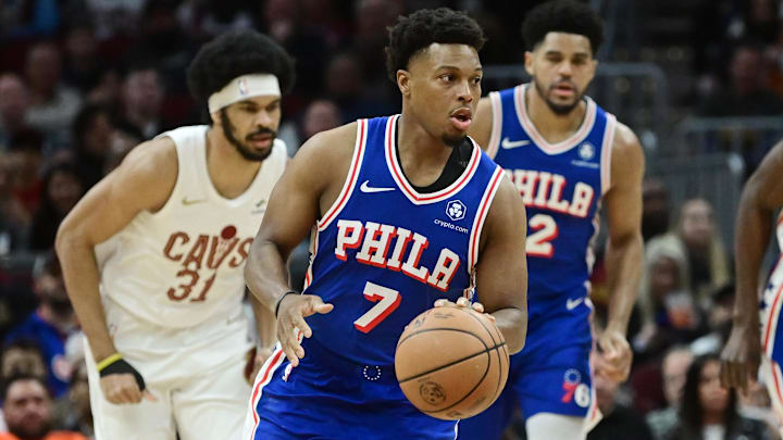 Mar 29, 2024; Cleveland, Ohio, USA; Philadelphia 76ers guard Kyle Lowry (7) brings the ball up court against the Cleveland Cavaliers during the first half at Rocket Mortgage FieldHouse. Mandatory Credit: Ken Blaze-Imagn Images
